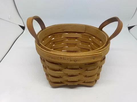 1993 Vintage Small Longaberger Basket With 5-1/2" in diameter (2 leather handles Cover