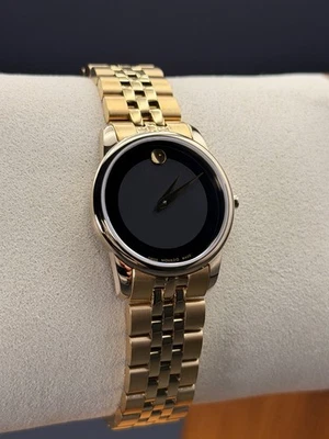 NEW MOVADO MUSEUM WOMEN’S GOLD TONE BLACK DIAL 28MM WATCH 0607005 - Image 1 of 4