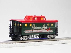 LIONEL CHRISTMAS LIGHT EXPRESS CABOOSE w INTERIOR LIGHTS O GAUGE 2123100-C NEW - Picture 1 of 5