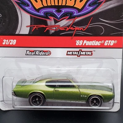 Pontiac GTO 31/39 verde oliva Real Riders Hot Wheels Phil's Garage '69  Foto 1 de 2