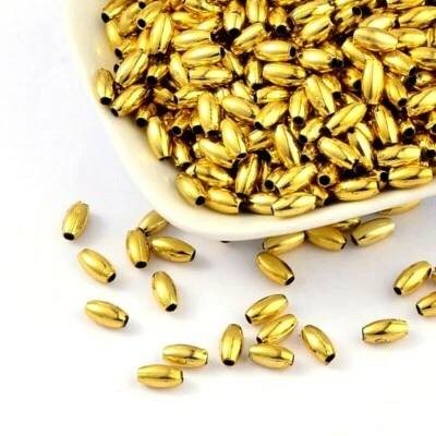 250stk Kunststoffperlen 8 x 4 mm Metallic Gold Oval Spacer Acryl Perlen R236 - Bild 1 von 3