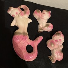 Three Vintage Mermaid Chalkware Plaques.