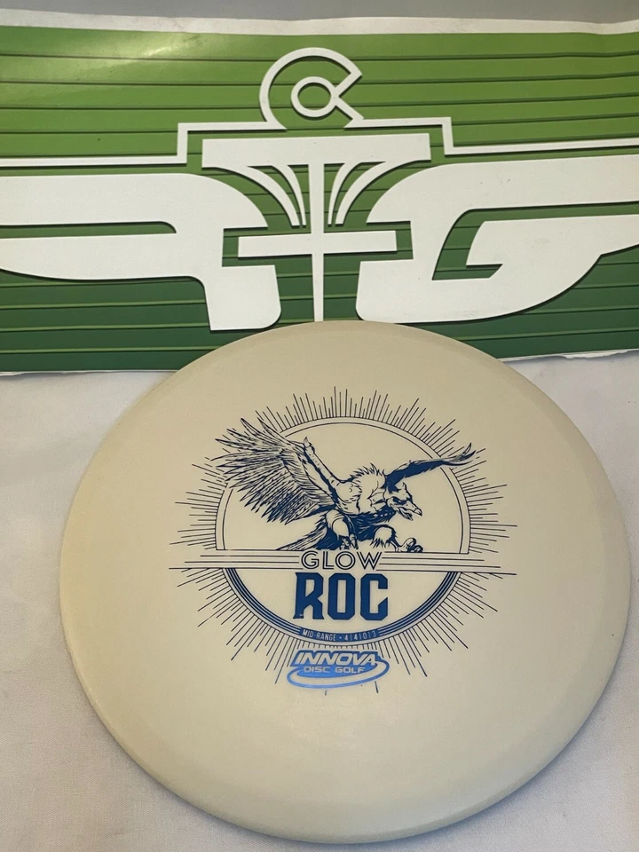 FLY GREEN DISC GOLF INNOVA DX GLOW ROC OS MIDRANGE DRIVER 175-180G BLUE  FOIL - Image 1 of 1
