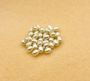81 Pcs Rice Shaped Glass Pearl Beads - White - 5x7mm - Picture 1 of 2