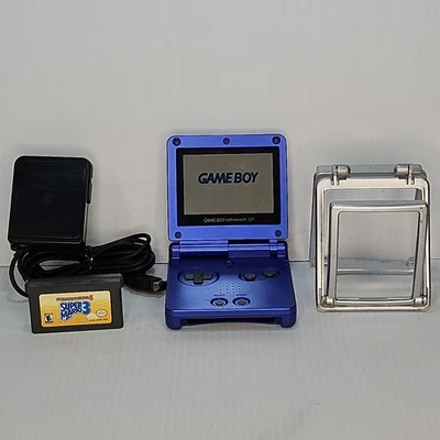 Nintendo Game Boy Advance SP Azul con Cargador + Super Mario 3 + Lupa Foto 1 de 4