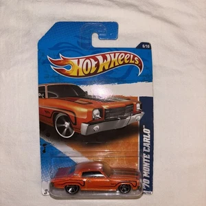2011 Hot Wheels #106 Muscle Mania 6/10 '70 MONTE CARLO arancione con raggi MC5 cromati - Foto 1 di 2