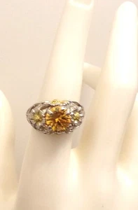 Fashion Ring, Unbranded, A Yellow-Gold Stone on a Silvertone Band, Size 8 - Picture 1 of 5
