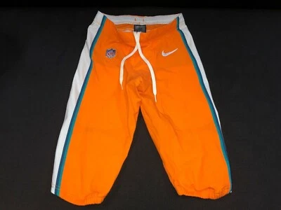 PANTALONES NIKE RUSH COLOR NARANJA EMITIDOS POR EL EQUIPO MIAMI DOLPHINS/JUEGO USADOS TODAS LAS TALLAS RAROS Foto 1 de 4