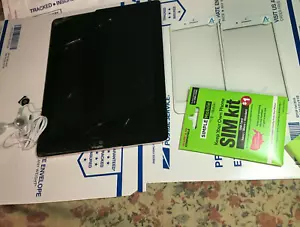 RARE apple ipad and extras and simple mobile kit E T C - Picture 1 of 3