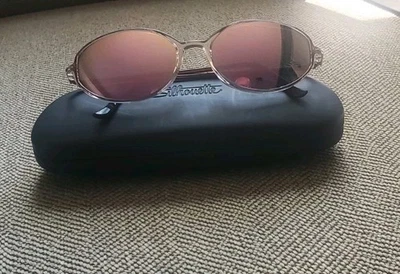 Gafas de sol polarizadas Silhouette SPX puente transparente/templos marrones ovaladas espejadas  Foto 1 de 4