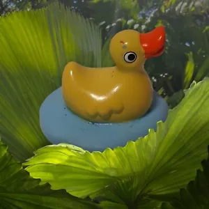 Miniature Yellow Duck in a Pond Plastic Toy 1.5"x1.4" Spring (tiny paint chip) - Picture 1 of 10