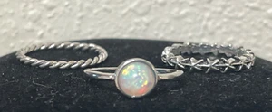 Lote vintage 3 anillos de diamantes de imitación llamativos conjunto de 7 estrellas opalescentes tono plata - Imagen 1 de 7