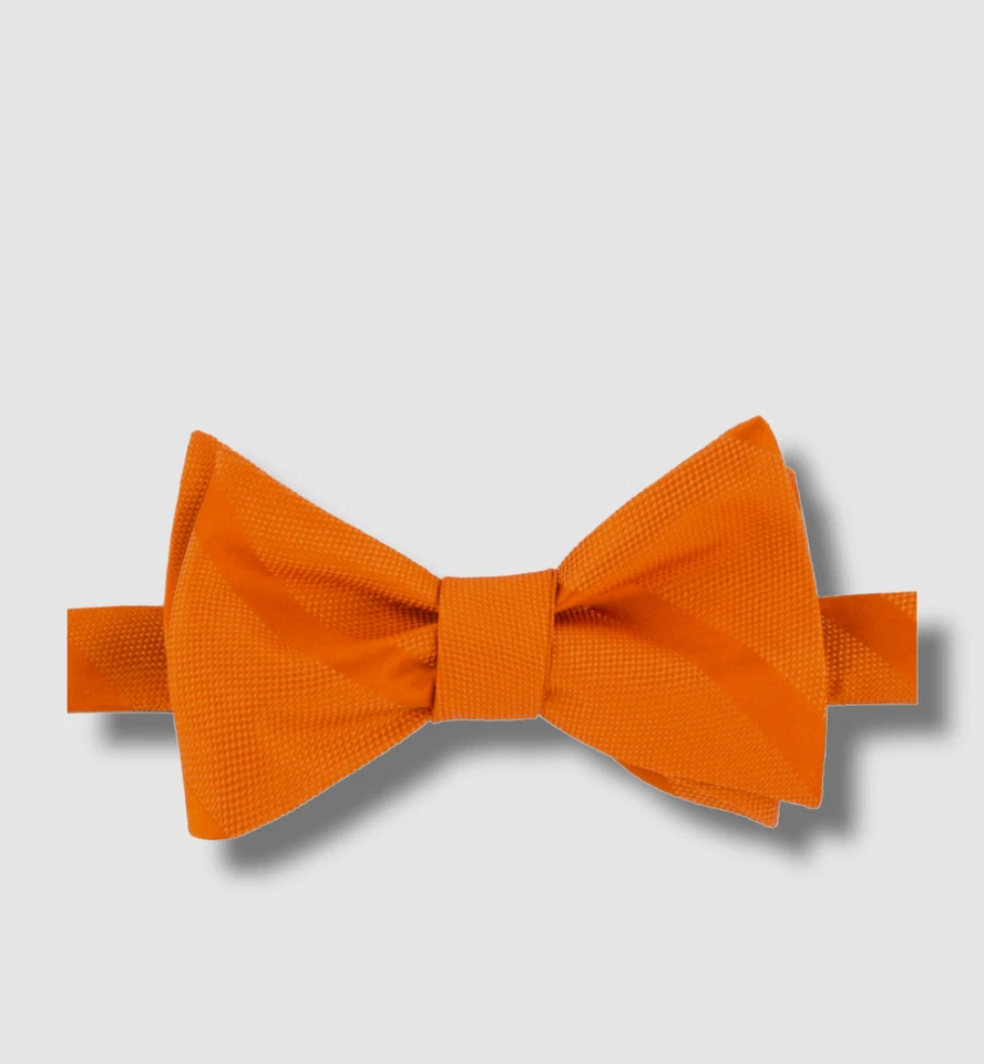 Pajarita de seda atada a rayas con textura naranja para hombre Tommy Hilfiger $49 Foto 1 de 1