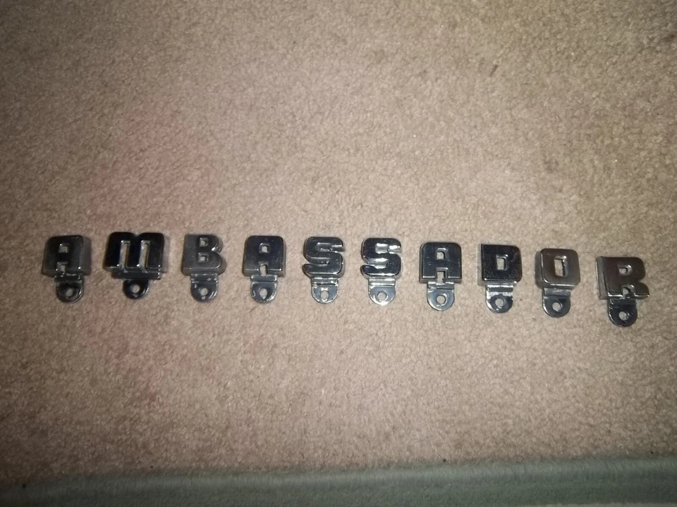 AMC RAMBLER 1958 EMBAJADOR PARRILLA EMBLEMA LETRAS NOS Foto 1 de 1