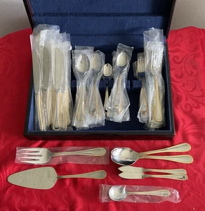 International Plata Acero Inoxidable Perla-Oro Acento Lote Mixto de 55 Piezas Sin Usar - Imagen 1 de 4