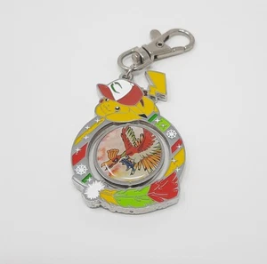 Pokemon Pluma Arco Iris Ho-Oh Película Giratorio Metal Llavero Dije 2" Lucario - Imagen 1 de 3