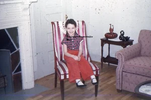 35MM Slide 1950s Kodachrome Red Border Young Girl Posing & Smiling In Chair - Picture 1 of 1