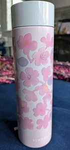 Starbucks Sakura 2025 aus Japan. Kirschblüte helllila Flasche.350 ml. Neu mit Etikett - Bild 1 von 14