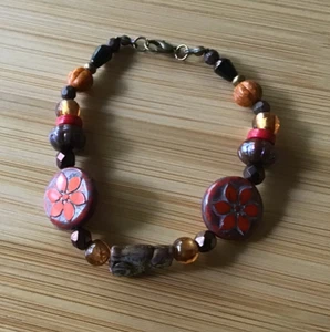 Handgefertigtes Armband im Boho Style, orange & braun - Bild 1 von 3
