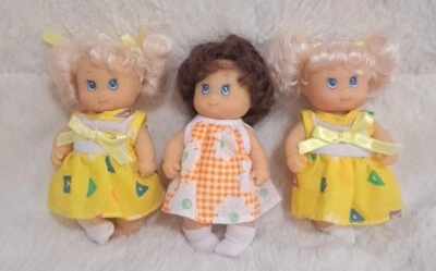 Cititoy Baby Sister Dolls Vintage 1990's Three Vinyl Dolls in Dresses 4 1/2" - Image 1 of 4