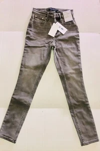 Pantalones de mezclilla ajustados Calvin Klein gris talla 24 99 % algodón nuevos con etiquetas - Imagen 1 de 4