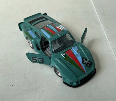 Macchinina BBurago Porsche 935 TT Verde 1/24 Model Kit Metal - Immagine 1 di 3