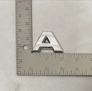 Nissan Armada “A” Emblem Letter Badge Decal Rear Door Hatch OEM Genuine - Bild 1 von 2