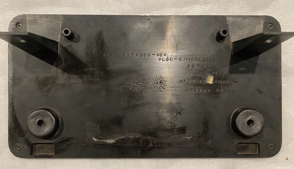 Ford OEM XF52 17A385 ACW Front License Plate Bracket Used - Image 1 of 1