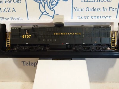 ATLAS 10004145 H.O.  FM-H24-66 "TRAINMASTER" PENNSYLVANIA  6707   WITH DCC+SOUND - Image 1 of 3