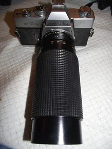 CUERPO DE CÁMARA FOTOGRÁFICA MINOLTA SRT-101 35 MM, CON LENTE ZOOM 60-300 MM F4,0-5,6, FUNCIONA - Imagen 1 de 10