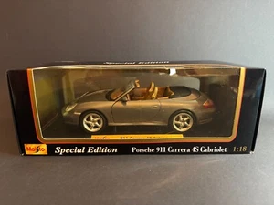 Maisto Porsche 911 (996) Carrera 4S Cabriolet Grigio Metallizzato (n.31611) 1:18 - Foto 1 di 16