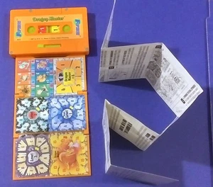 Vintage 1987 Milton Bradley Flipsiders Dragon Master gioco tascabile cassetta arancione - Foto 1 di 6
