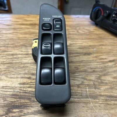 94 95 96 Mitsubishi Mirage/Colt/Summit Power Window Switch Master 4 puertas Foto 1 de 4