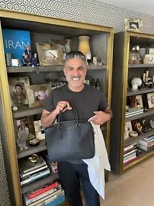 Valigetta centro in pelle nera di sandro paris di proprietà di Reza Farahan - Foto 1 di 10