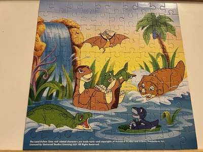 "Rompecabezas de colección 2004 The Land Before Time 100 piezas dibujos animados de dinosaurios 12"" niños" Foto 1 de 4