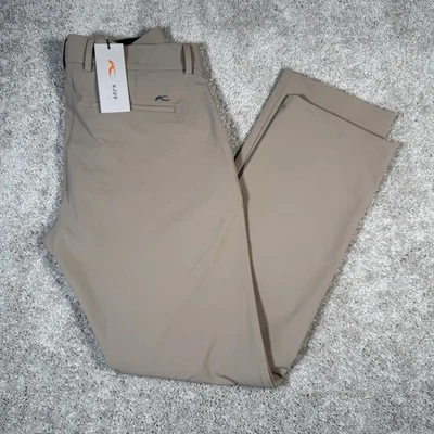 Pantalones de golf KJUS Performance IKE calce regular para hombre 33x32 caqui tostado $189 nuevos con etiquetas Foto 1 de 4