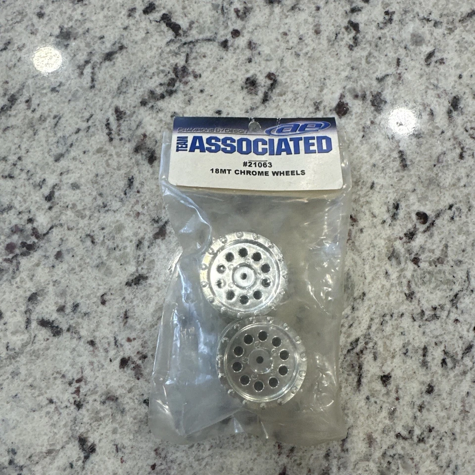 NEW Team Associated 21063 18MT Chrome Wheels - Image 1 of 1