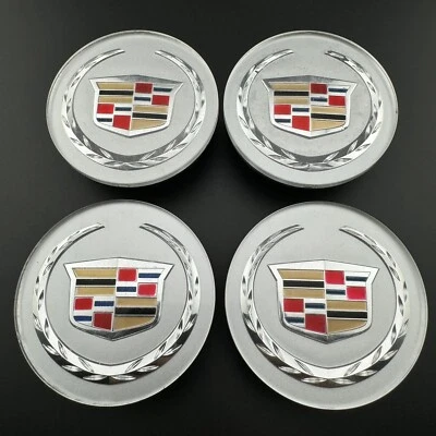 JUEGO DE TAPACUBOS CENTRALES DE RUEDA CADILLAC SRX DTS STS CTS ATS XTS 9596628 2,625" PULGADAS DE ANCHO Foto 1 de 4