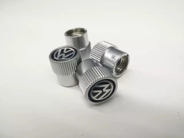 Genuine Valve Stem Caps - Black On Silver 000-071-215-J - Image 1 of 1