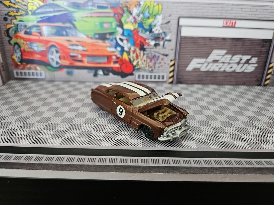 1/64 Johnny Lightning 1951 Hudson Hornet brown w stripes Combine postage VGC - Image 1 of 4