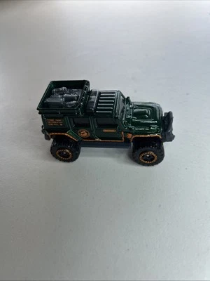 2011 Matchbox Jeep Wrangler Superlift Hunter Green with Orange Accents - Image 1 of 4