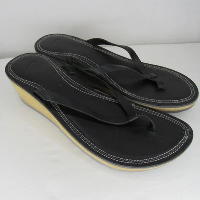 Sandalia chancla de cuña de cuero negra Nike para mujer 11 Foto 1 de 4