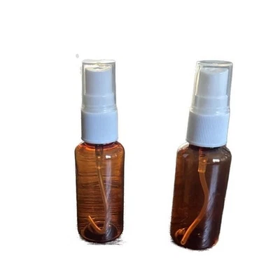 Amber 1 oz / 30 ml Boston Round PET (BPA Free) Plastic Bottle with pump-12 Pack - Image 1 of 4