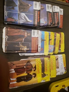 Lotto di 14 modelli per costumi semplicità e McCall's non tagliati - Foto 1 di 5