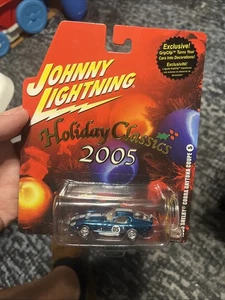 HOLIDAY CLASSIC BLUE CHROME 1965 SHELBY CORBA DAYTONA COUPE BY JOHNNY LIGHTNING - Picture 1 of 4