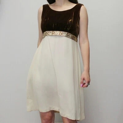 Mini Vestido Babydoll Vintage Años 60 Terciopelo con Detalle de Lazo Floral Metálico Foto 1 de 4