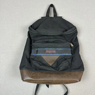 Mochila vintage JanSport EE. UU. parte inferior de cuero negro retro bolsa de libros de senderismo 1999 Foto 1 de 4
