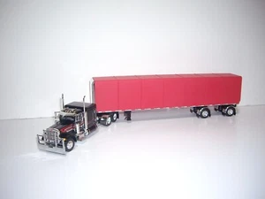 DCP FIRST GEAR 1/64 BLACK PETE 379 WITH SLEEPER AND SIMULATED ROLL TARP TRAILER - Picture 1 of 17