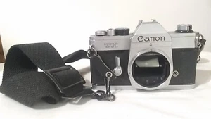 Canon TX SLR Camera Body Only FOR PARTS 35mm With Adj. Removable Strap READ - Picture 1 of 7