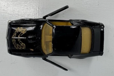 Coche de juguete vintage Ertl negro Pontiac Turbo Firebird BANDIT Trans Am 1980 1:64 Foto 1 de 4